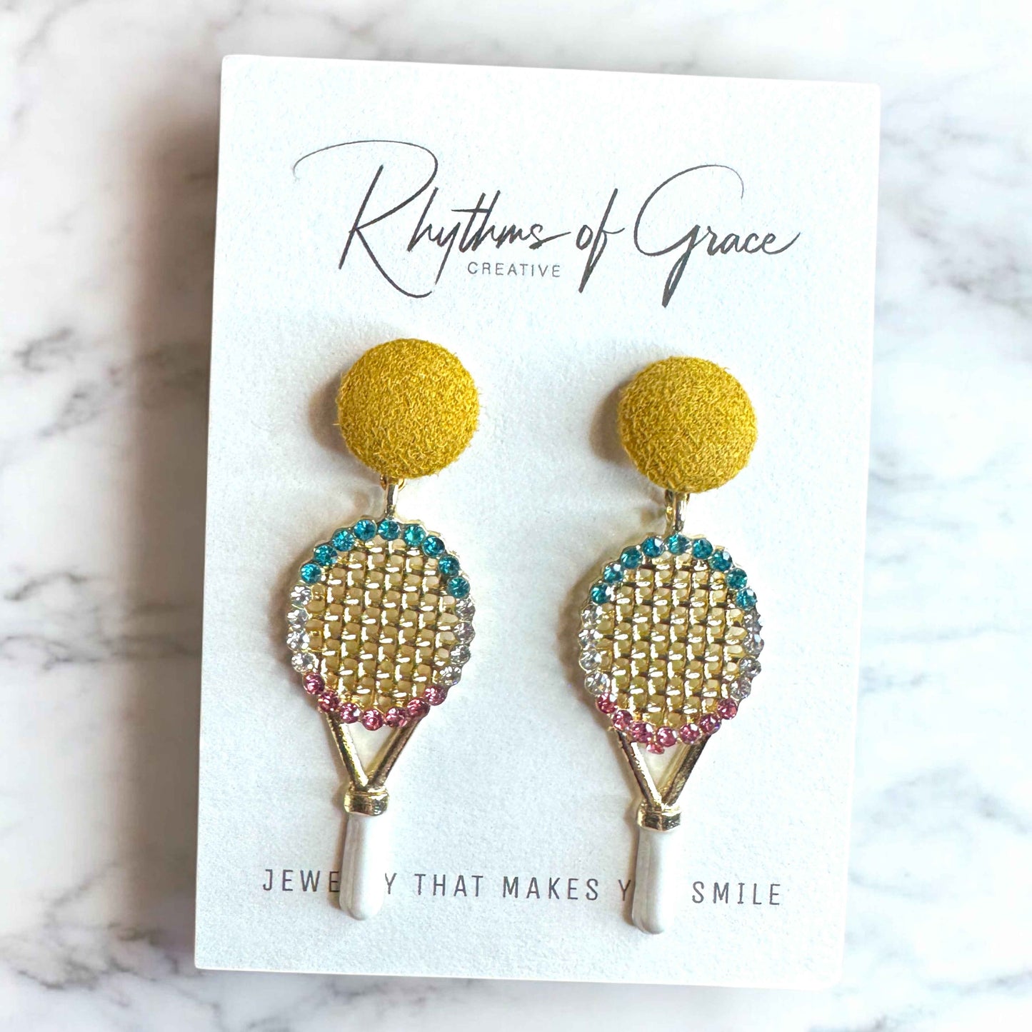 Sparkle on the Court with Our Rhinestone Tennis Racket Dangle Earrings! 🎾