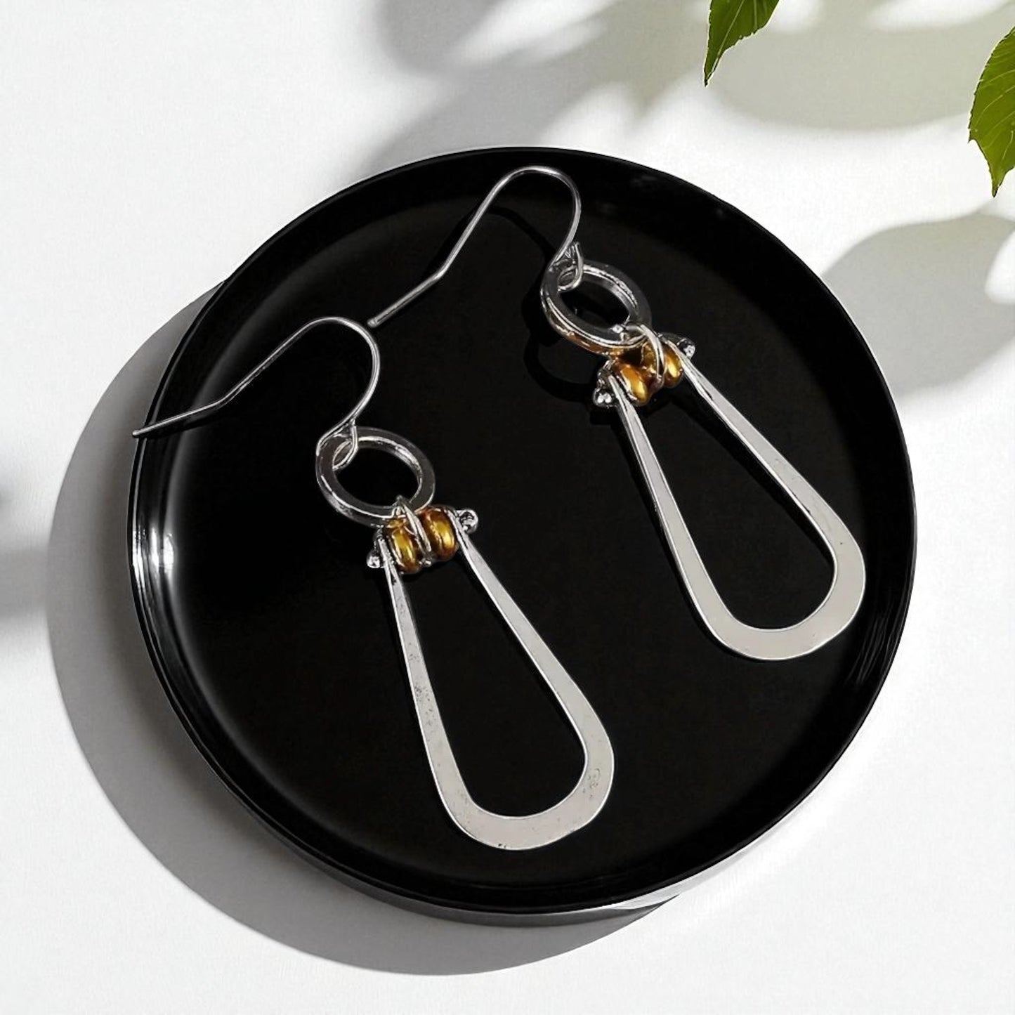 Day to Night Dazzle โ Silver & Gold Dangle Earrings