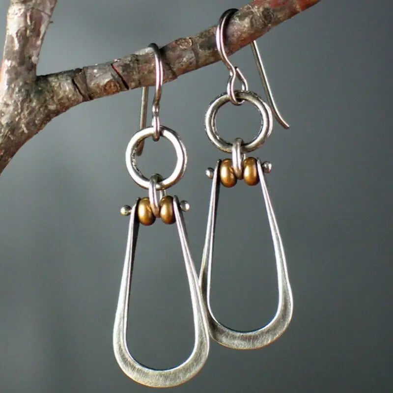 Day to Night Dazzle โ Silver & Gold Dangle Earrings