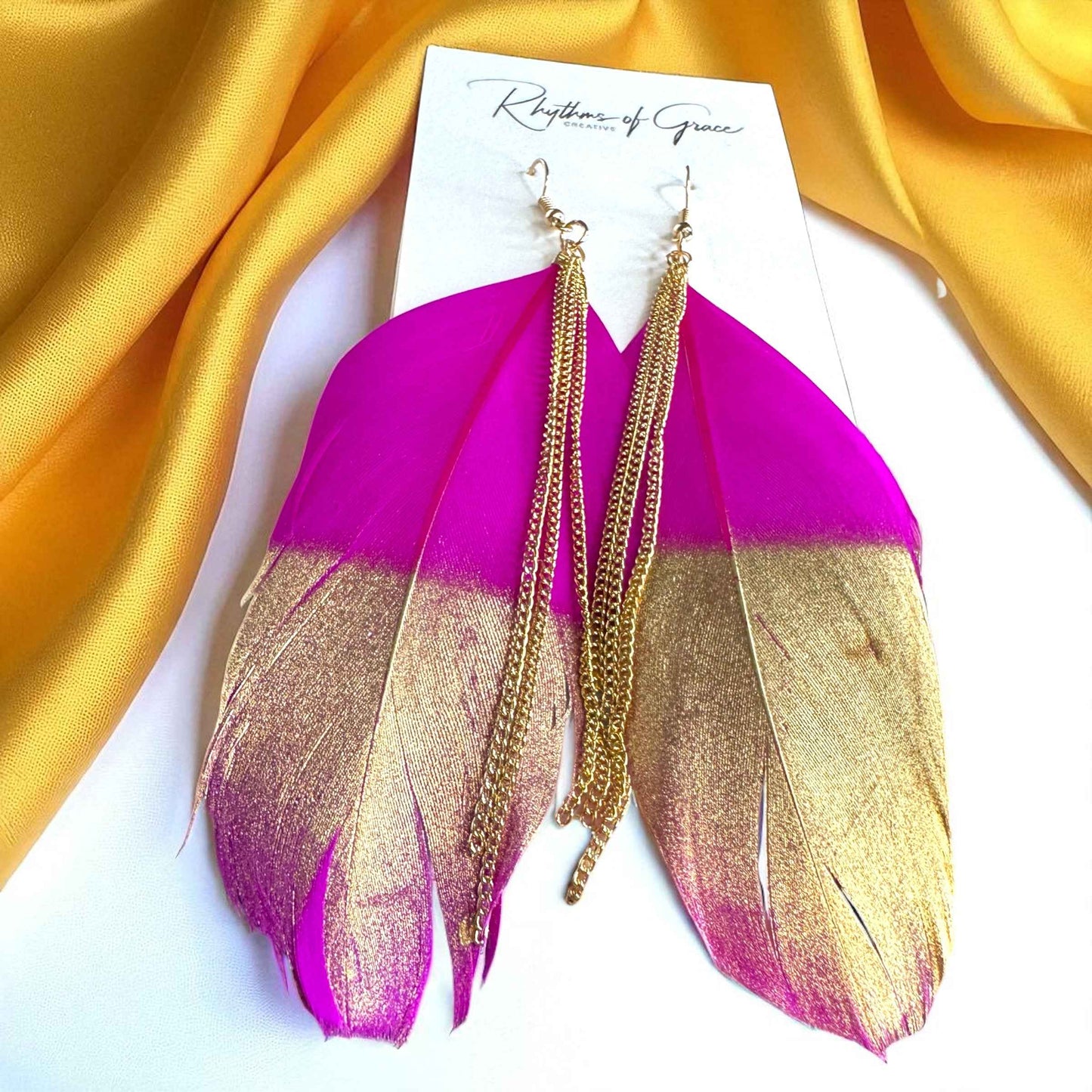 Gold Dipped Feather Earrings: Dance Into the Festivity!