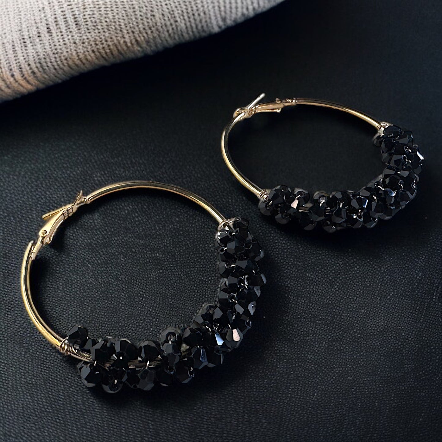 Chic Elegance: Black & Gold Beaded Hoop Earrings