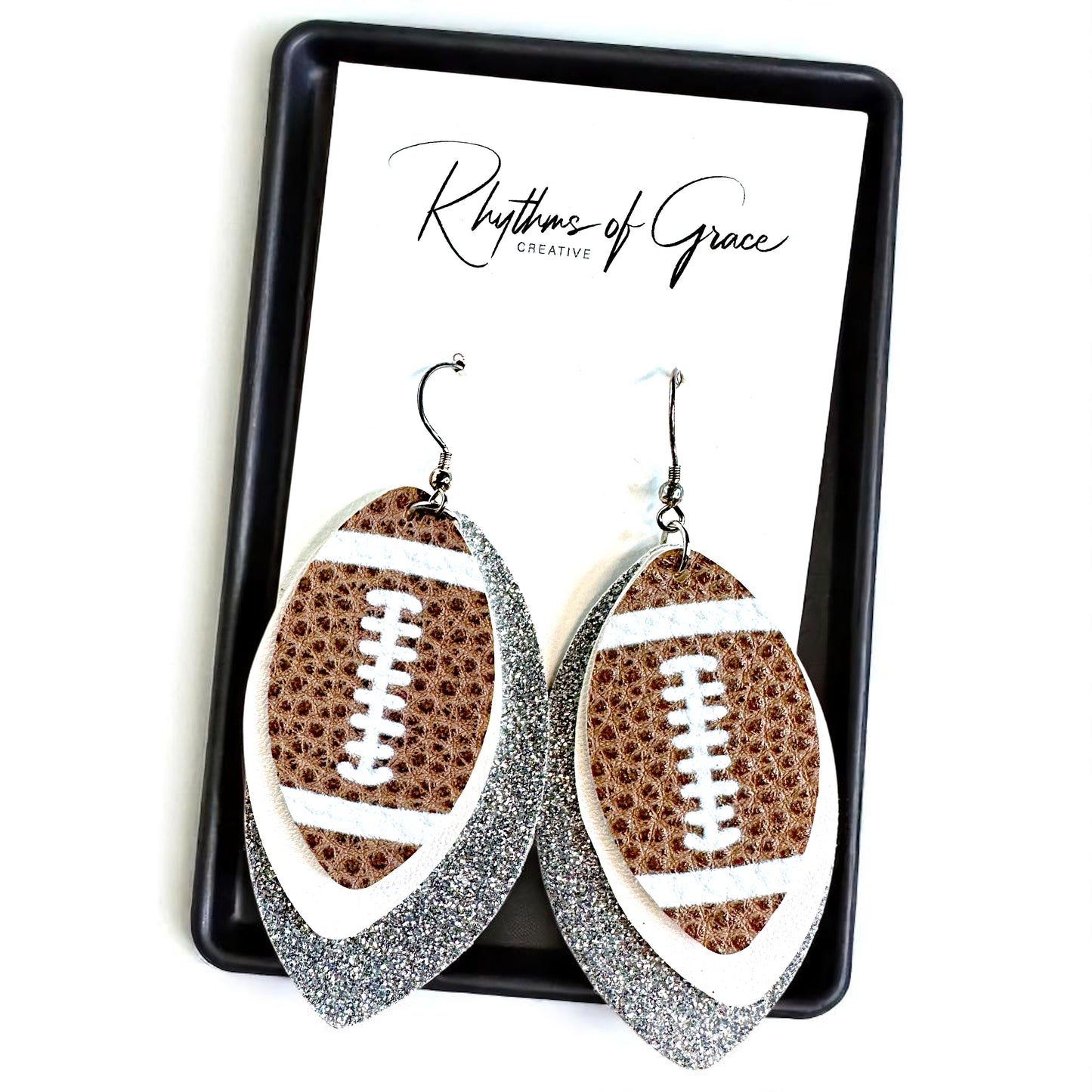 Game Day Glam: Silver and White Football Earrings for the Ultimate Fan!