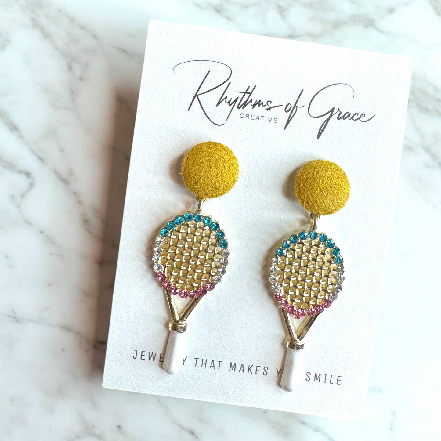 Sparkle on the Court with Our Rhinestone Tennis Racket Dangle Earrings! 🎾