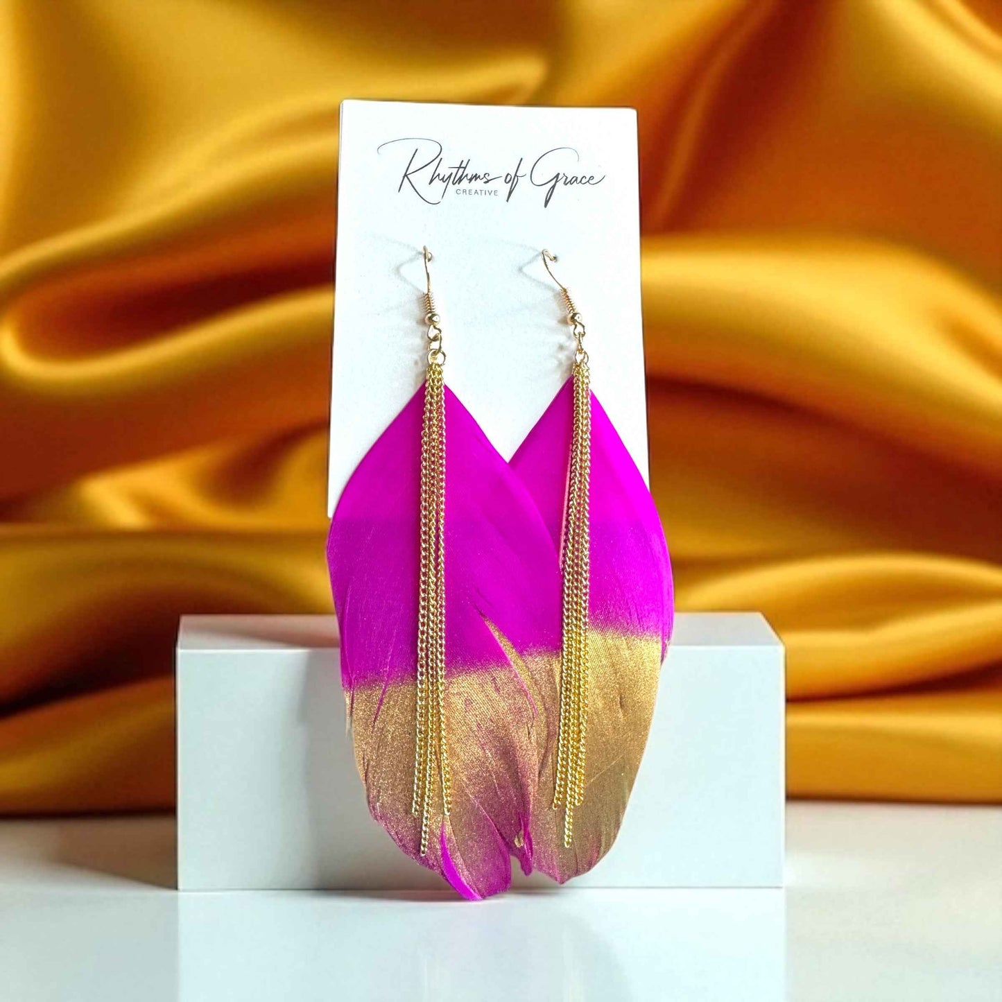 Gold Dipped Feather Earrings: Dance Into the Festivity!