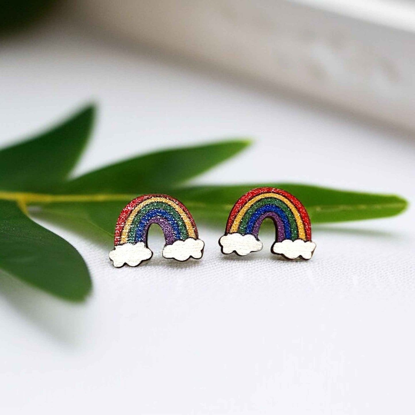 Rainbow Radiance: Handmade Wooden Studs for Every Occasion!