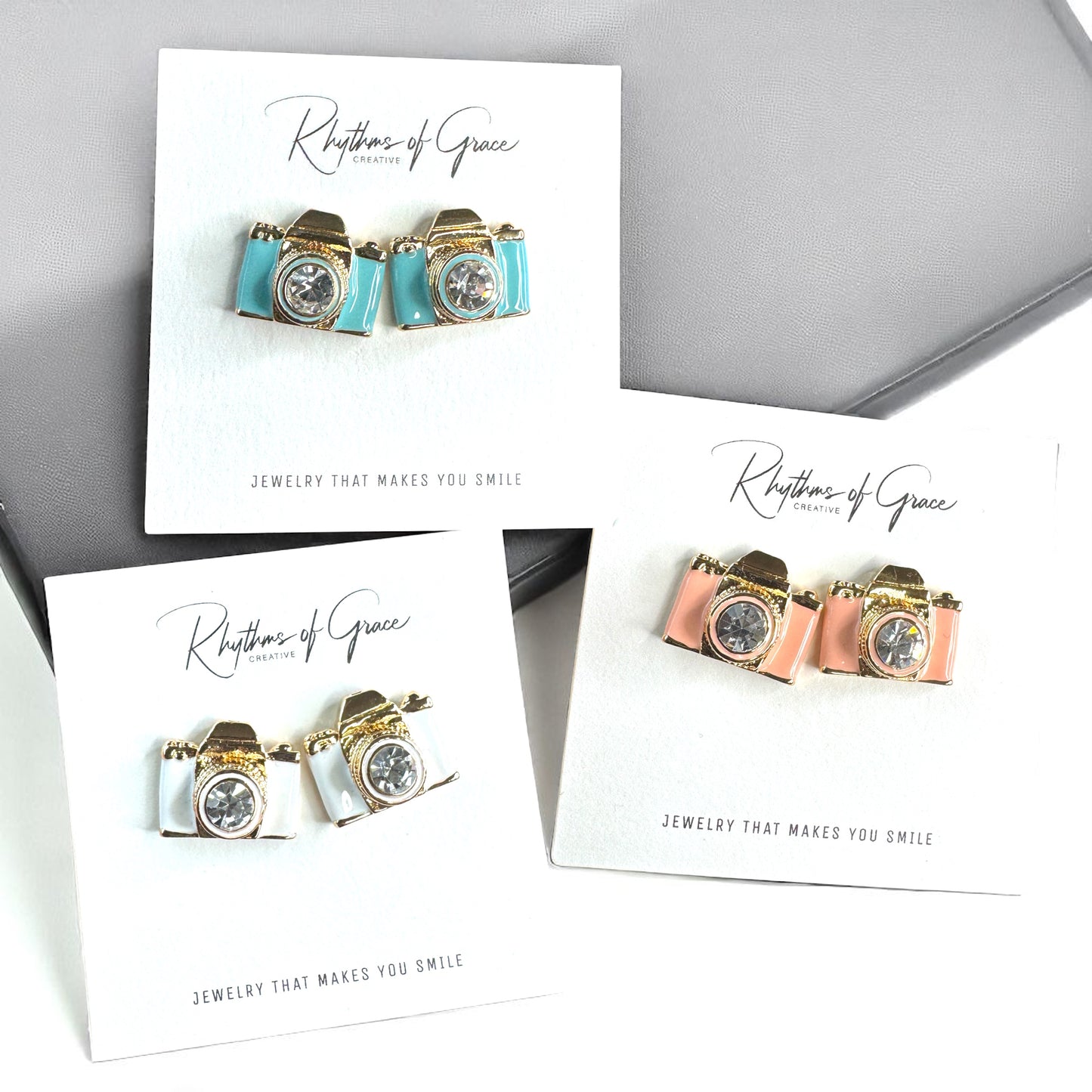 Snap Chic: Dazzling Camera Rhinestone Stud Earrings in White, Pink & Blue!