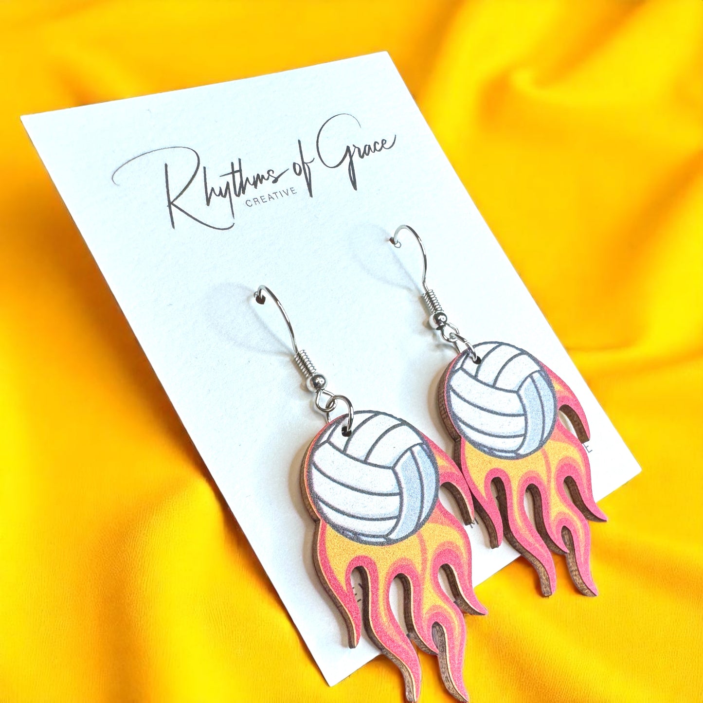 Score Big Style with Flaming Volleyball Dangle Earrings!