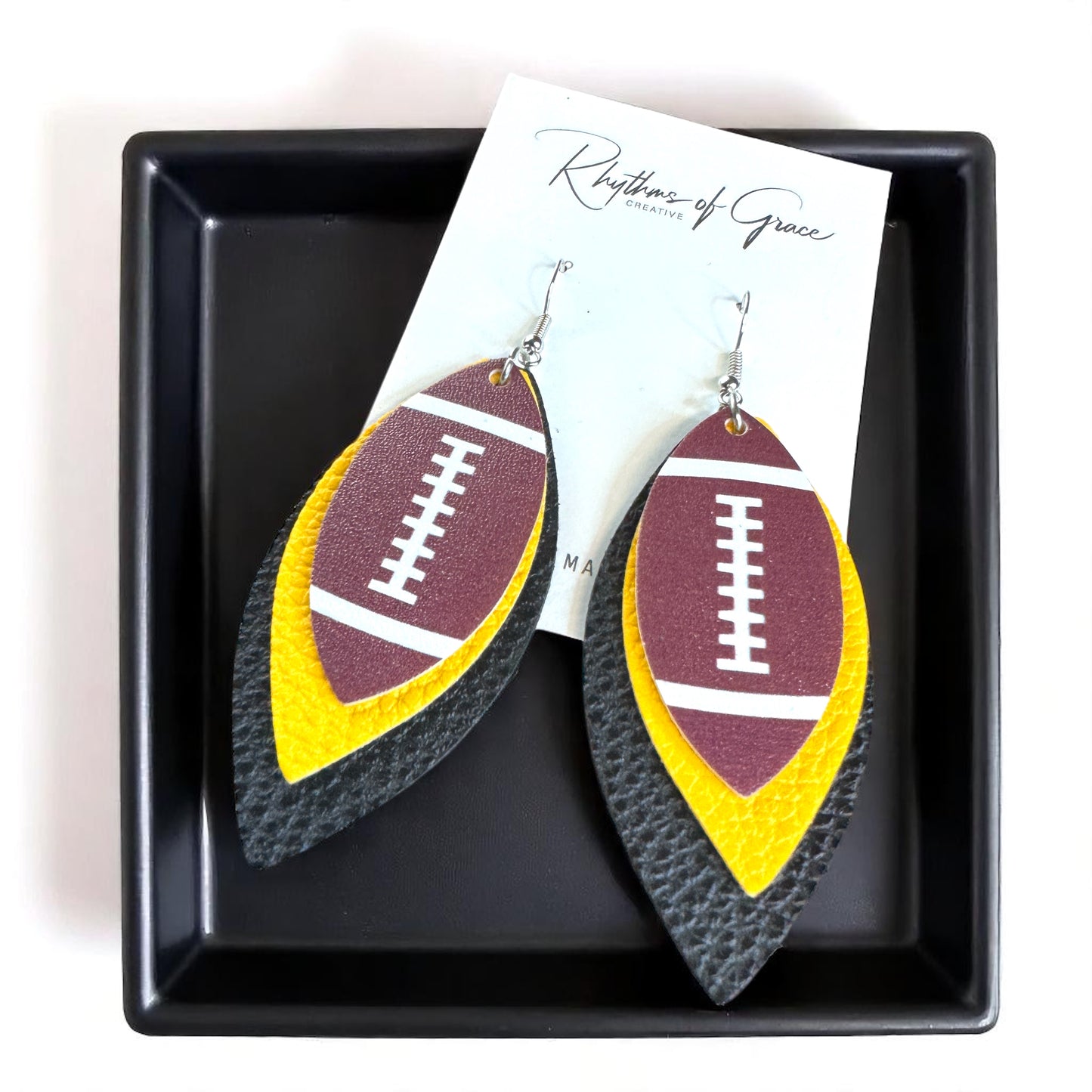 Chic Fan Flair: Black and Gold Football Earrings Perfect for Game Day Glam!