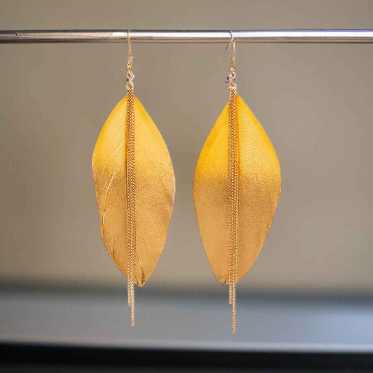 Gold Dipped Feather Earrings: Dance Into the Festivity!