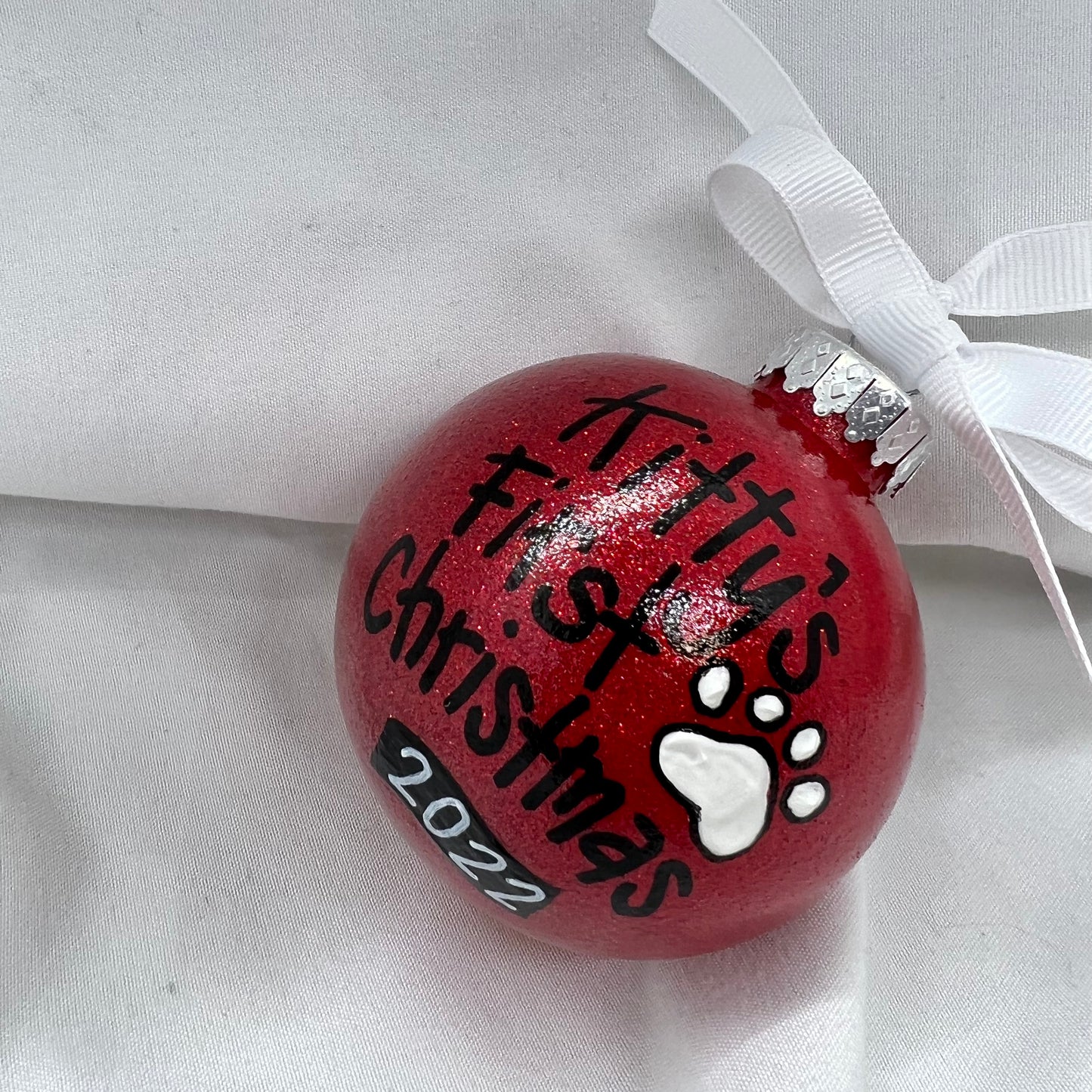 Pawsitively Adorable: Kitty's First Christmas Ornament!