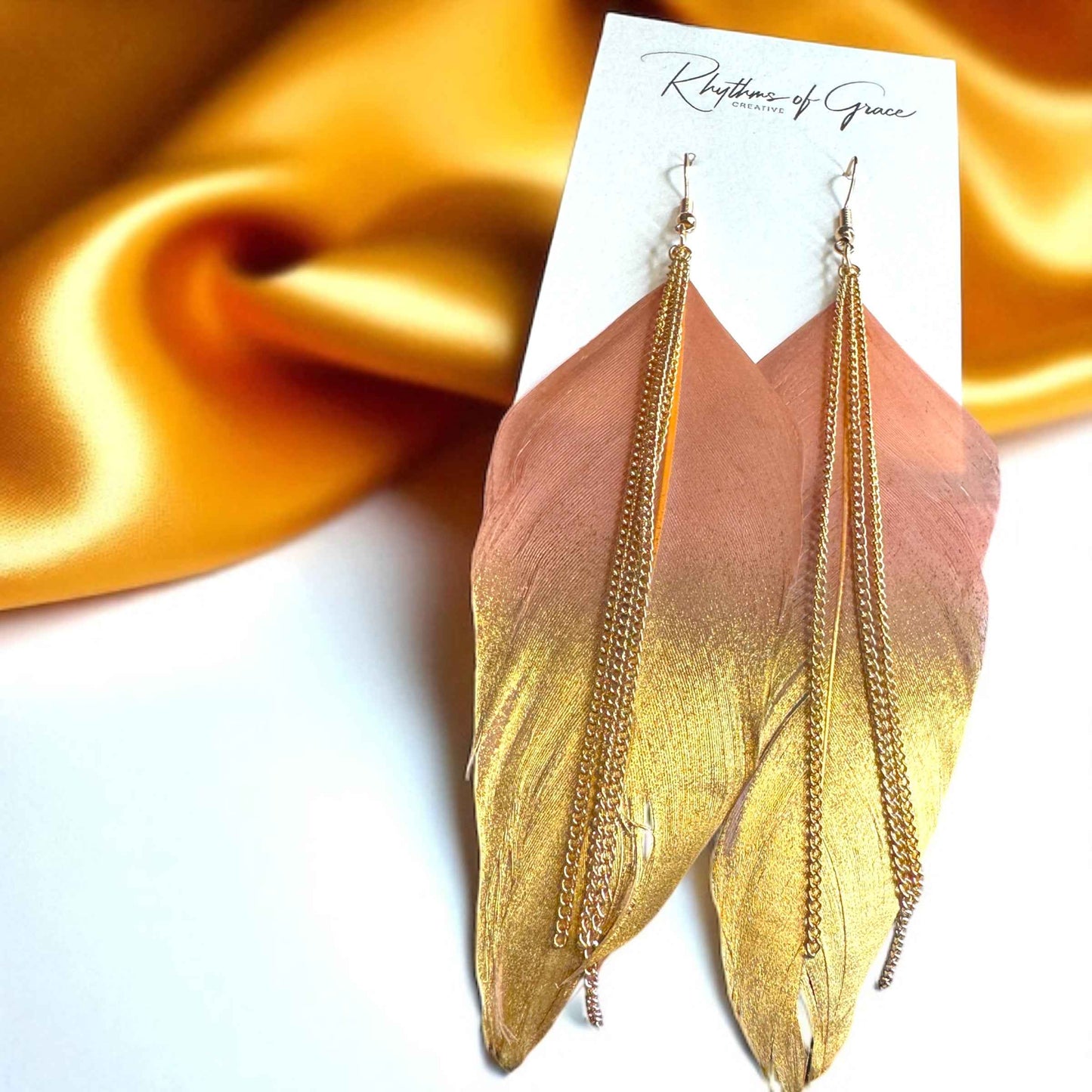 Gold Dipped Feather Earrings: Dance Into the Festivity!