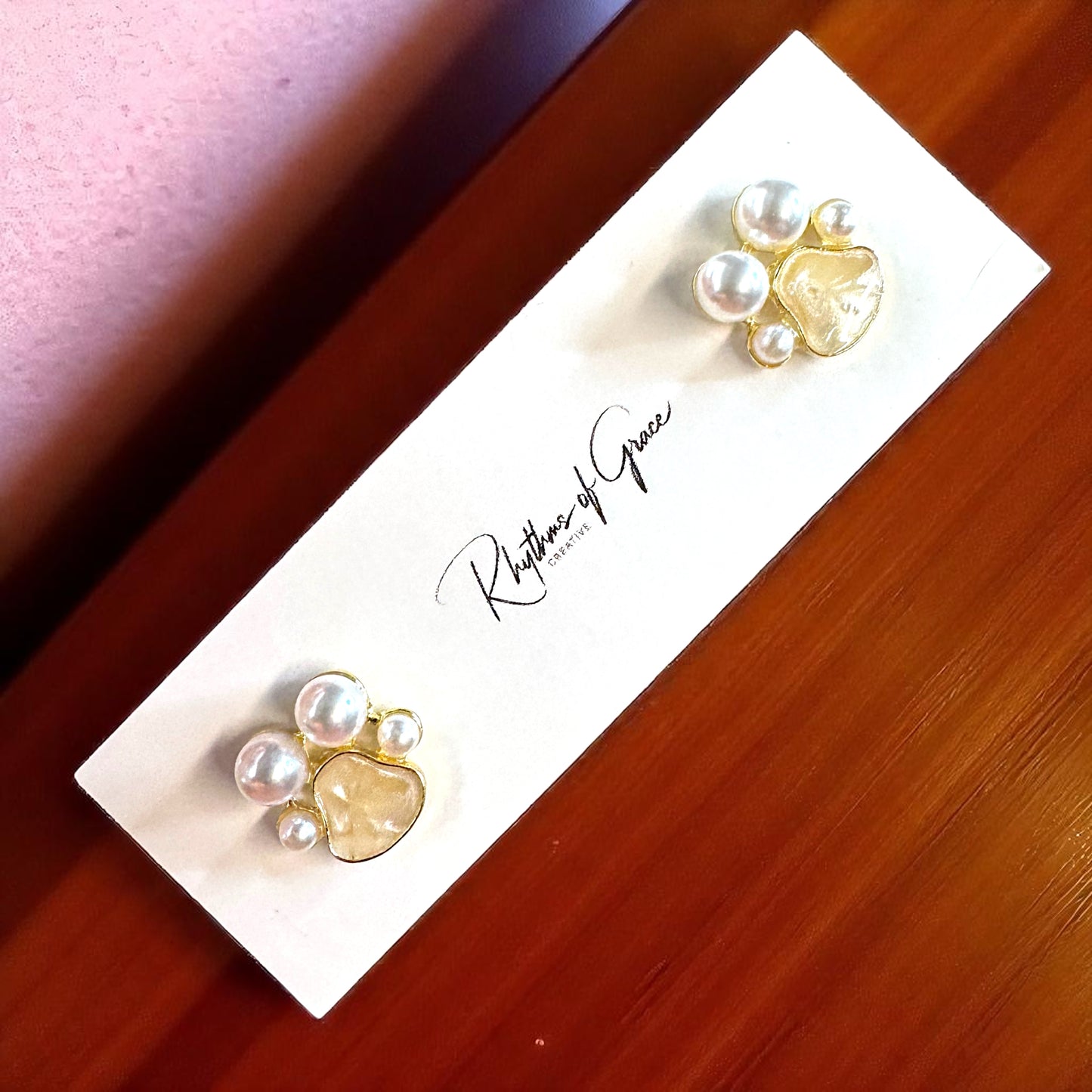 Sparkle with Style: Pearl Paw Print Stud Earrings! 🐾