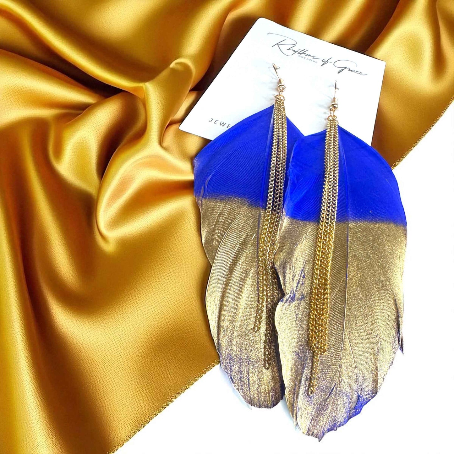Gold Dipped Feather Earrings: Dance Into the Festivity!