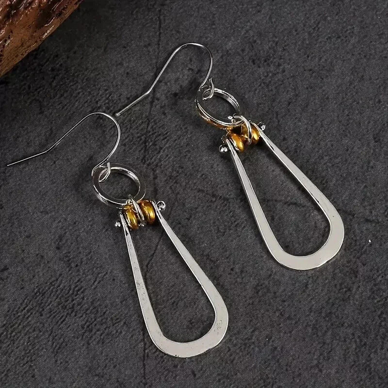 Day to Night Dazzle โ Silver & Gold Dangle Earrings
