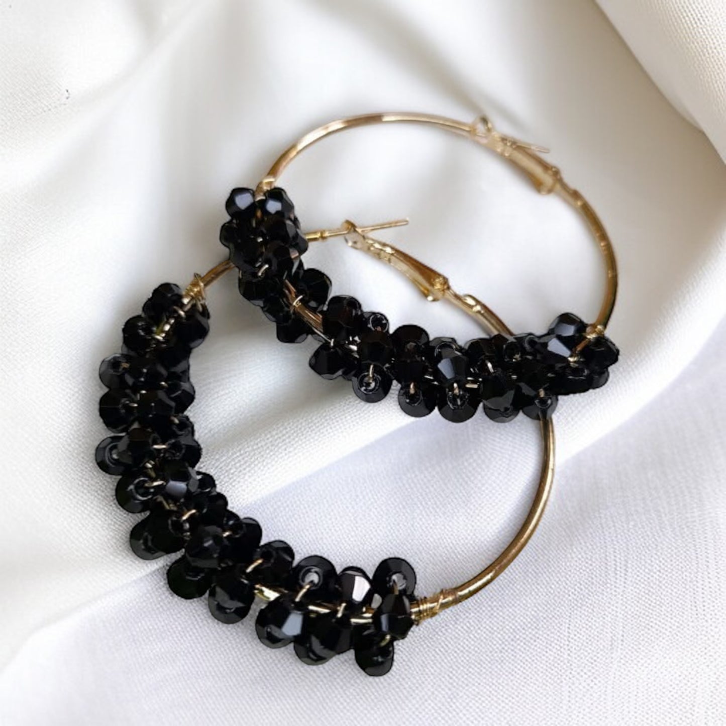 Chic Elegance: Black & Gold Beaded Hoop Earrings