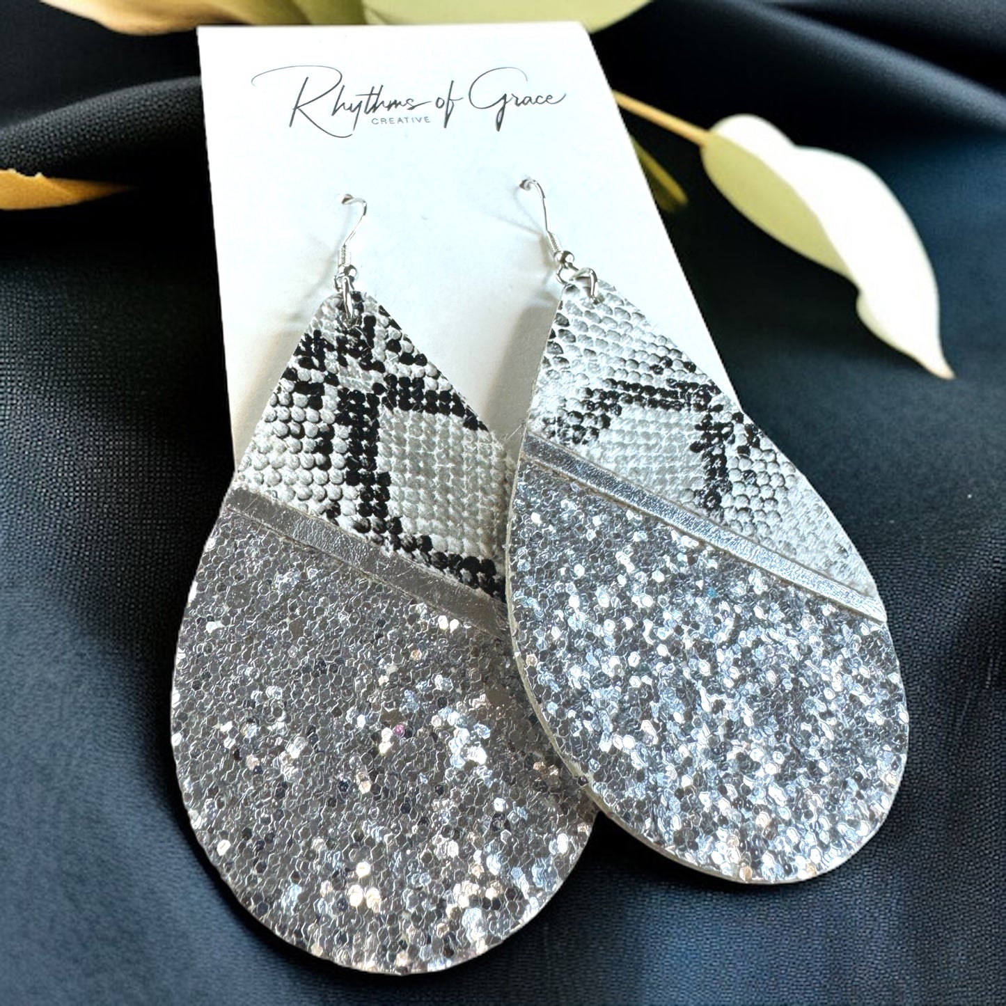 Slither in Style with Our Snake Print Teardrop Dangle Earrings! 🐍
