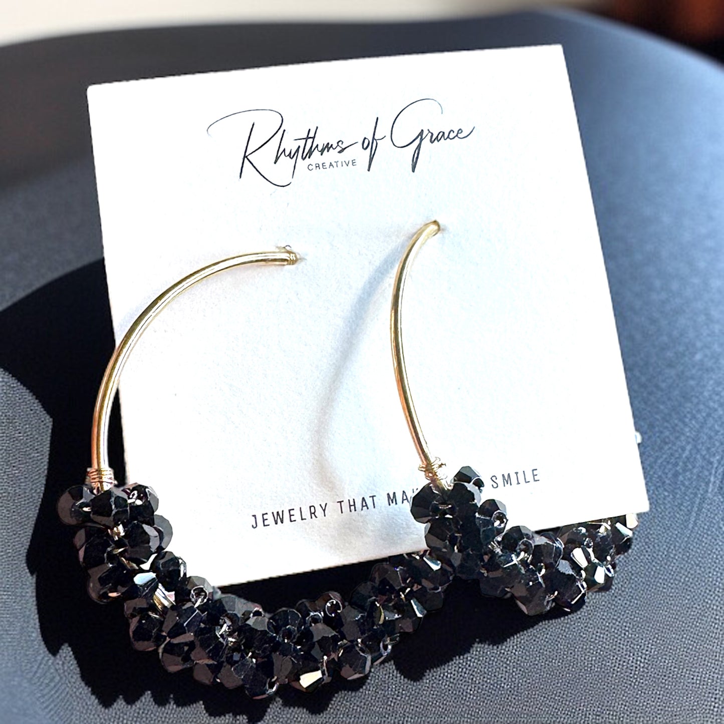 Chic Elegance: Black & Gold Beaded Hoop Earrings