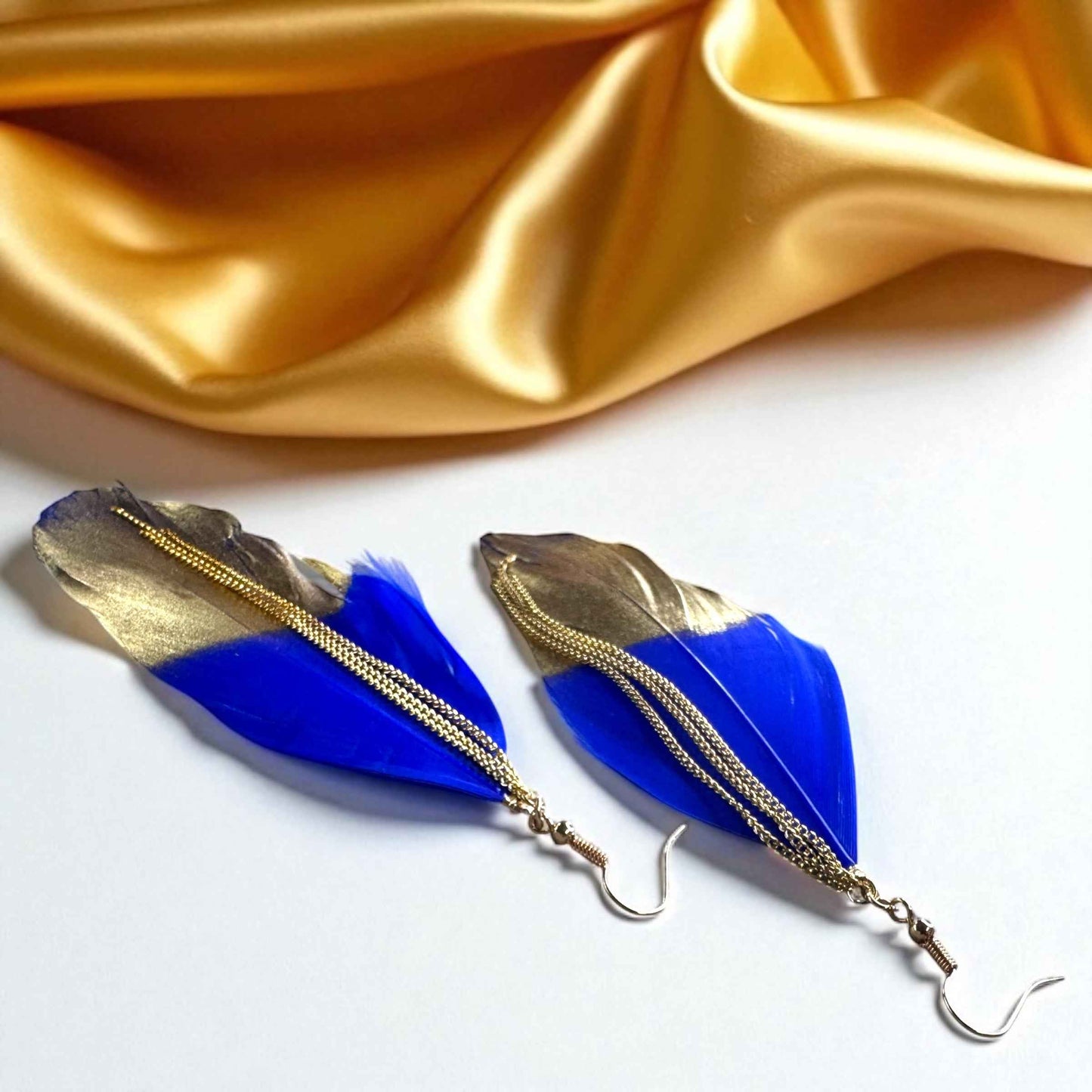 Gold Dipped Feather Earrings: Dance Into the Festivity!