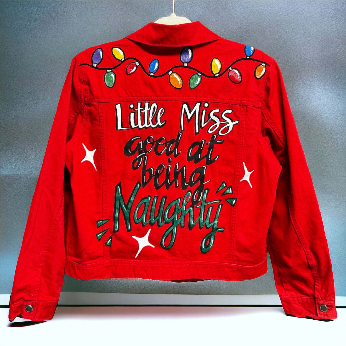 Hand Painted Jean Jacket: “Little Miss Good At Being Naughty”