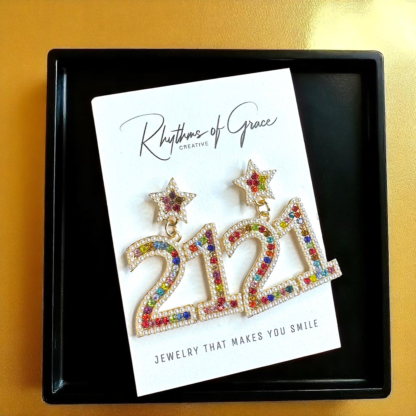 Sparkle into 21 with Our Rhinestone “21” Dangle Earrings!