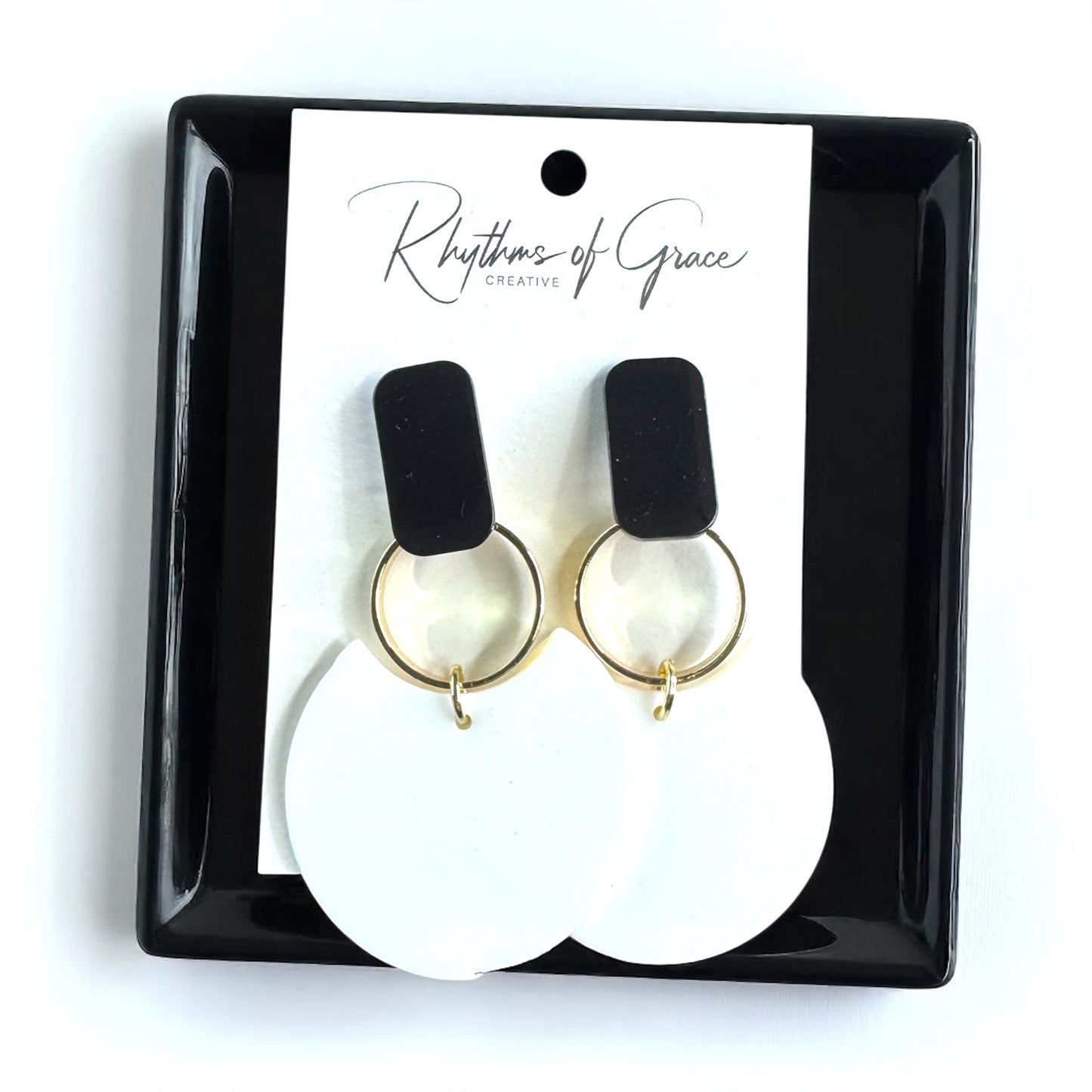 Chic & Cheerful: Black & White Dangle Earrings