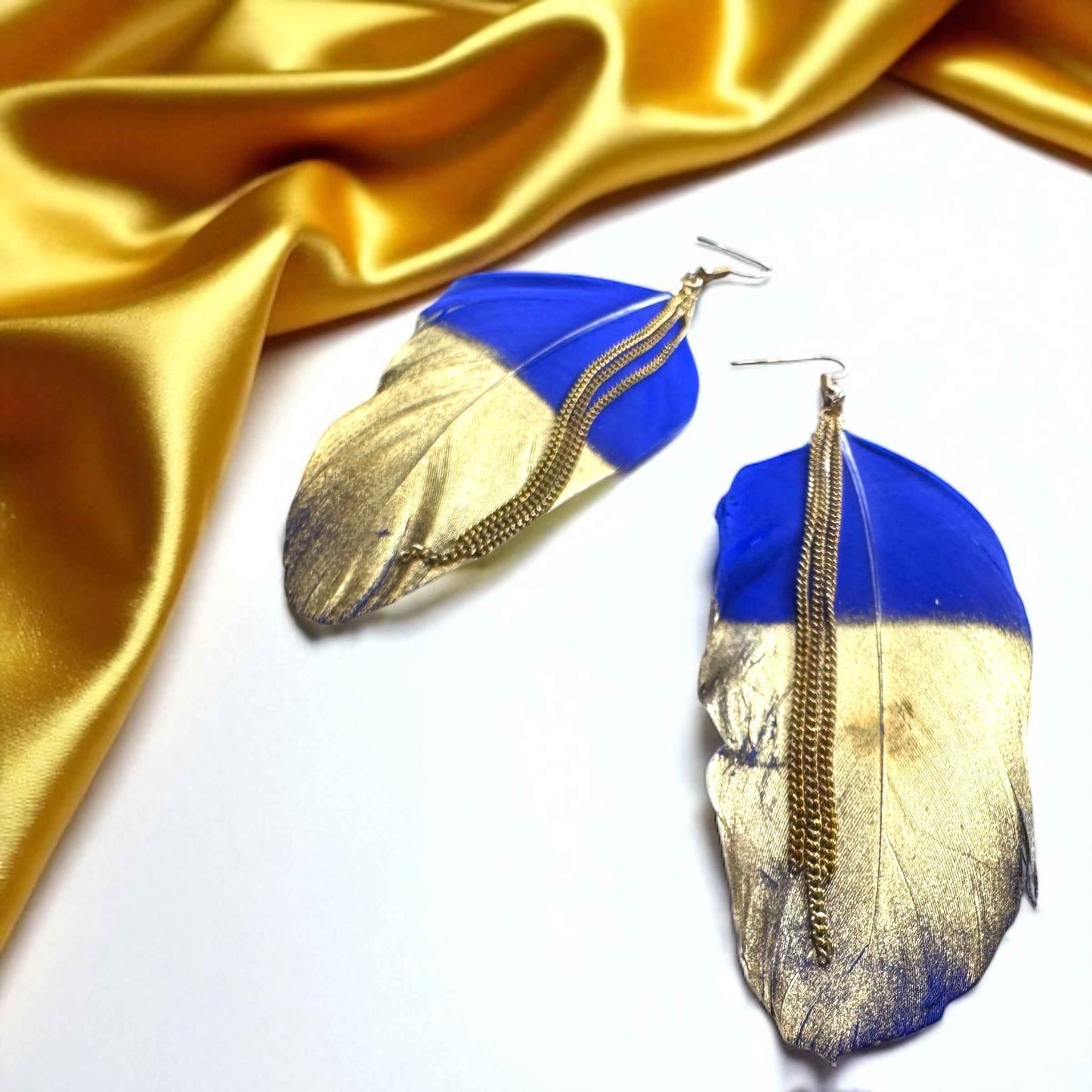 Gold Dipped Feather Earrings: Dance Into the Festivity!