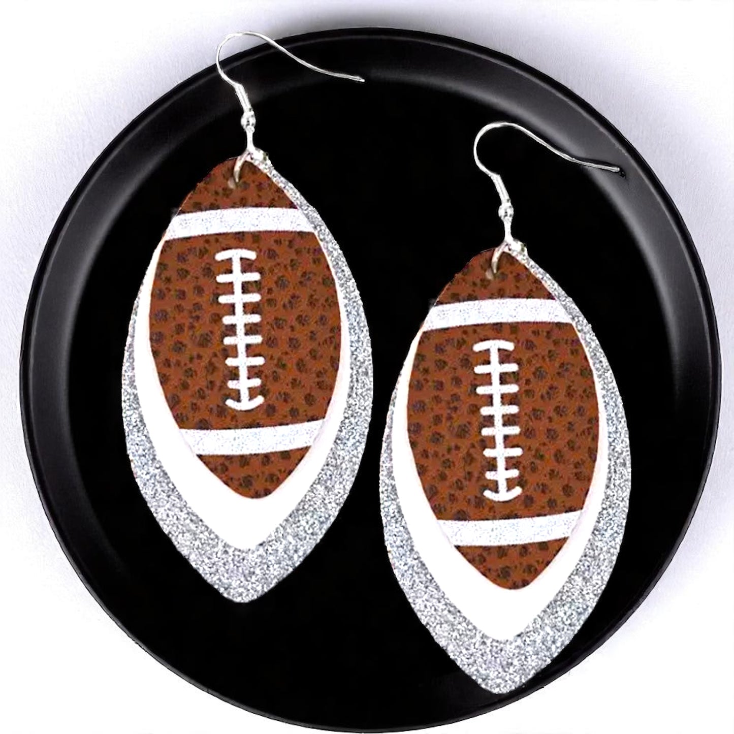 Game Day Glam: Silver and White Football Earrings for the Ultimate Fan!