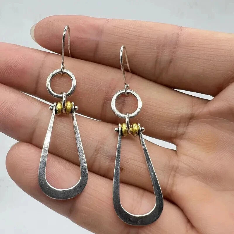Day to Night Dazzle โ Silver & Gold Dangle Earrings
