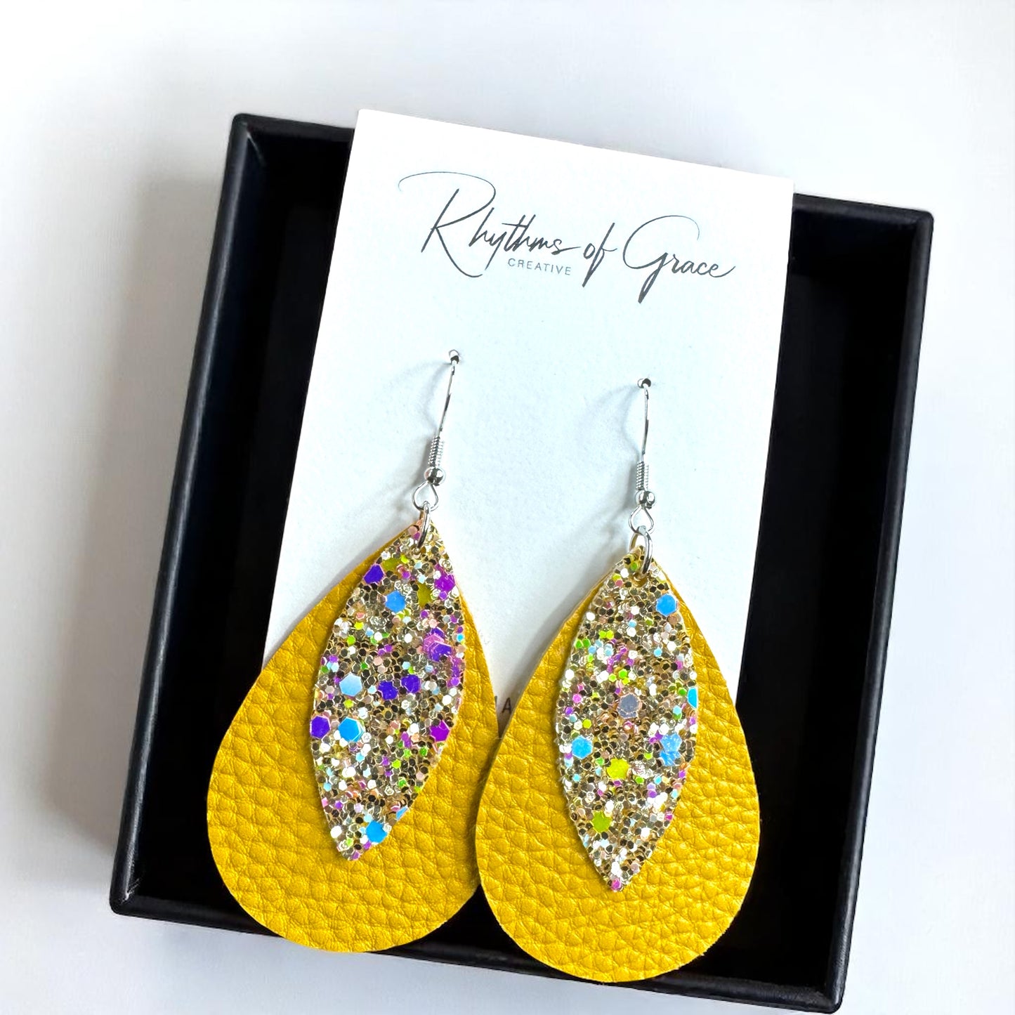 Golden Glow Teardrop Dangles: Shine Bright in Yellow!