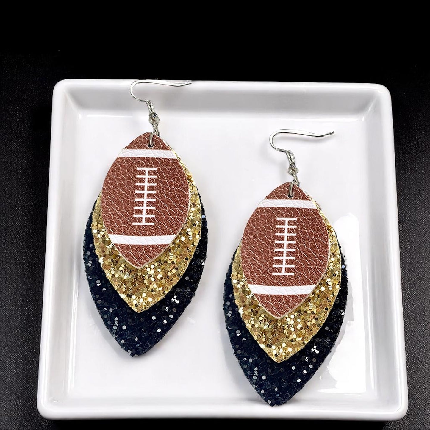 Game Day Glam: Black and Gold Glitter Football Earrings for the Ultimate Fan!