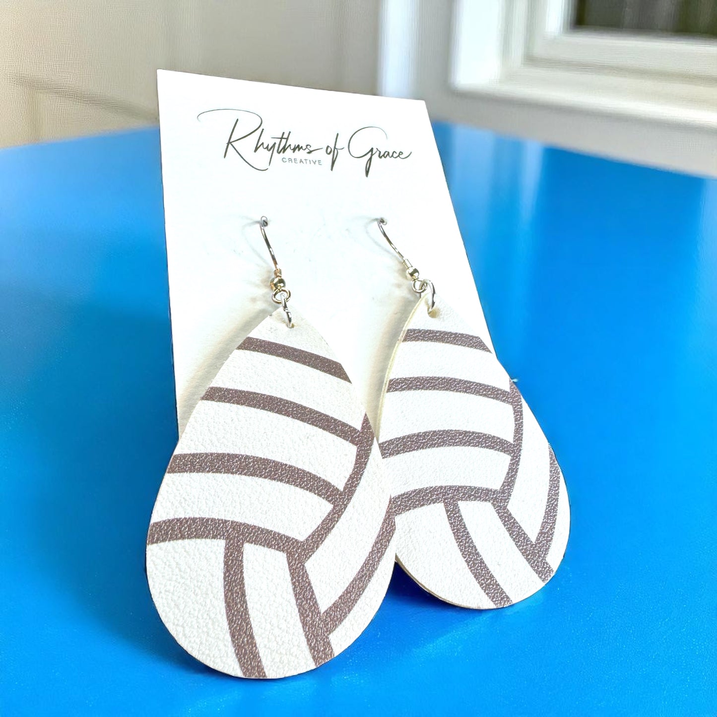 Spike Your Style: Volleyball Dangle Earrings! 🏐