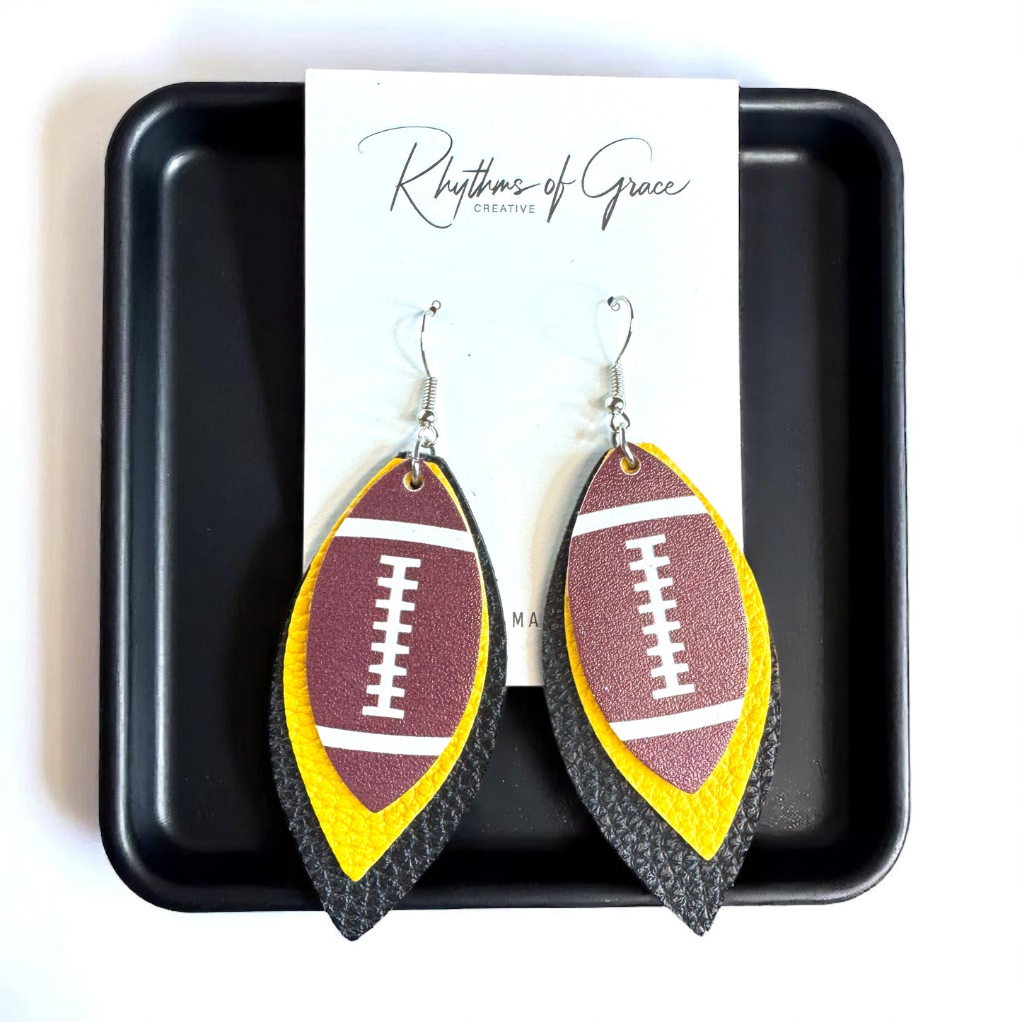 Chic Fan Flair: Black and Gold Football Earrings Perfect for Game Day Glam!