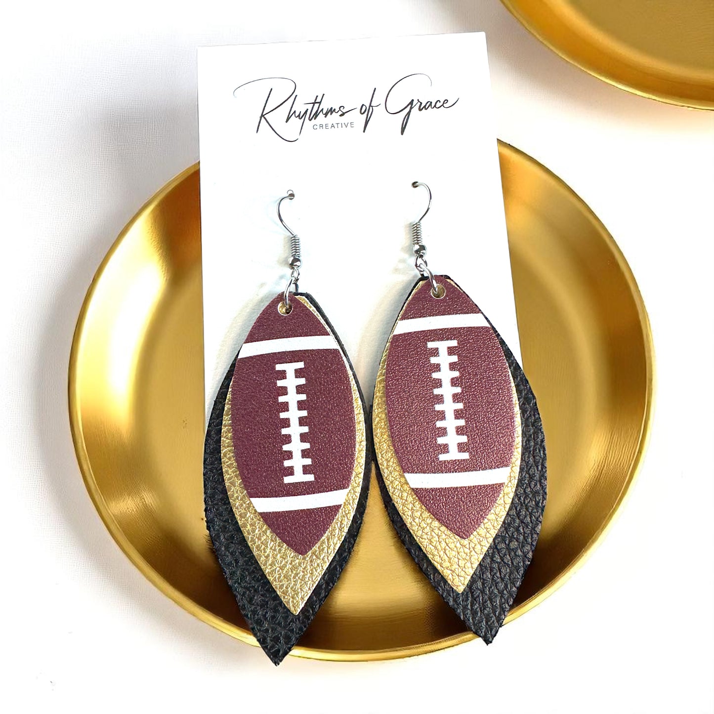 Touchdown in Style: Black and Gold Football Earrings for the Fashion-Forward Fan!
