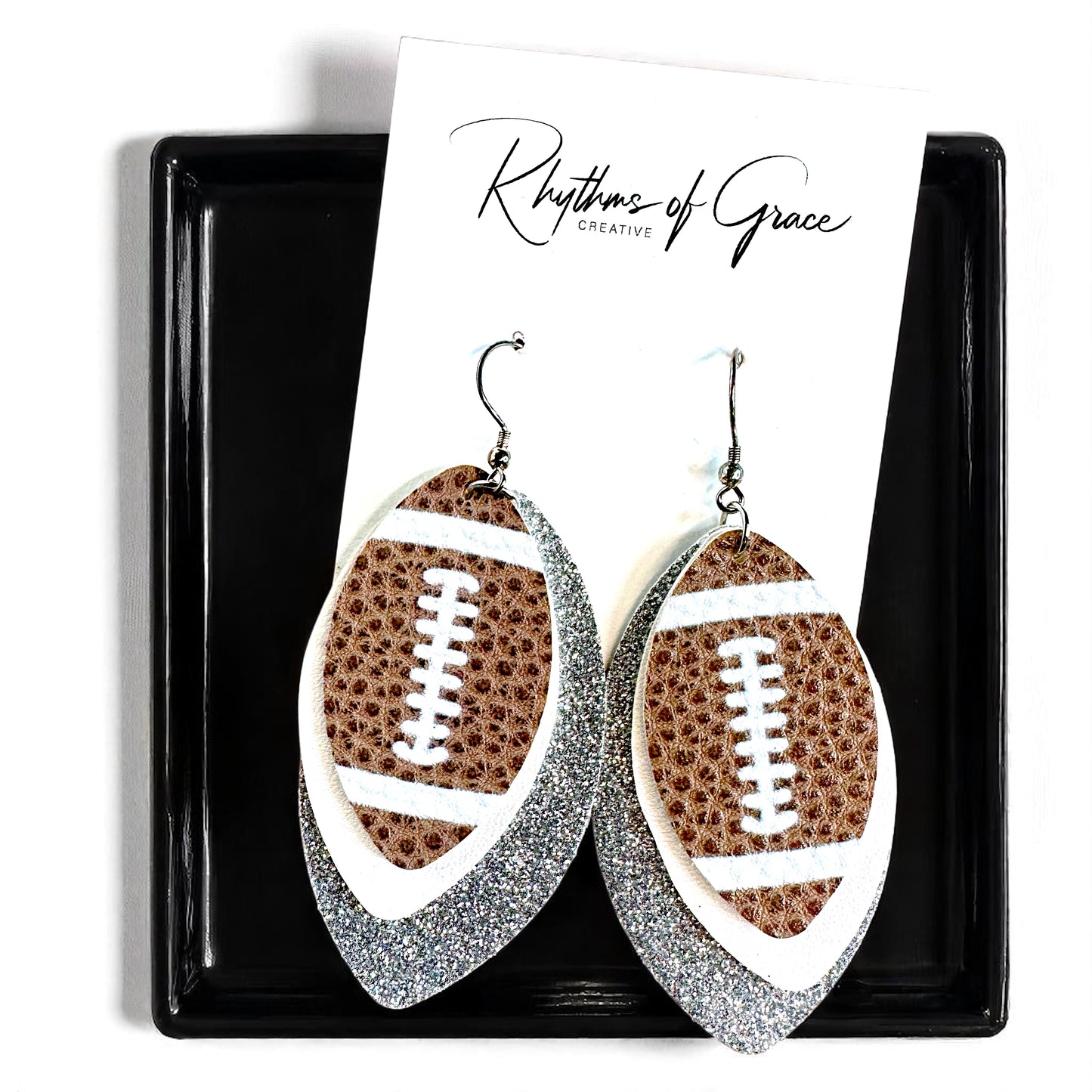 Game Day Glam: Silver and White Football Earrings for the Ultimate Fan!