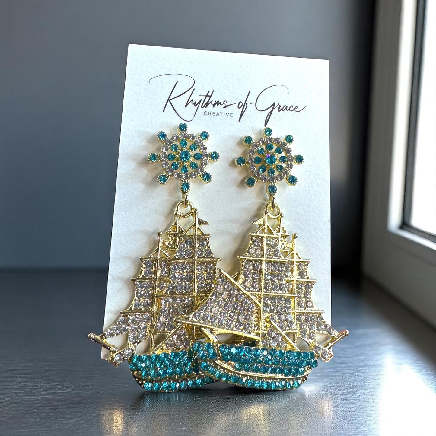 Sail Away in Style: Rhinestone Sailboat Dangle Earrings