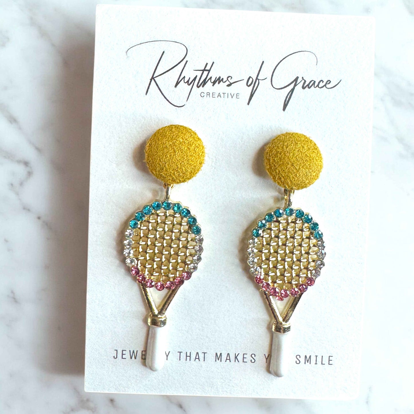 Sparkle on the Court with Our Rhinestone Tennis Racket Dangle Earrings! 🎾