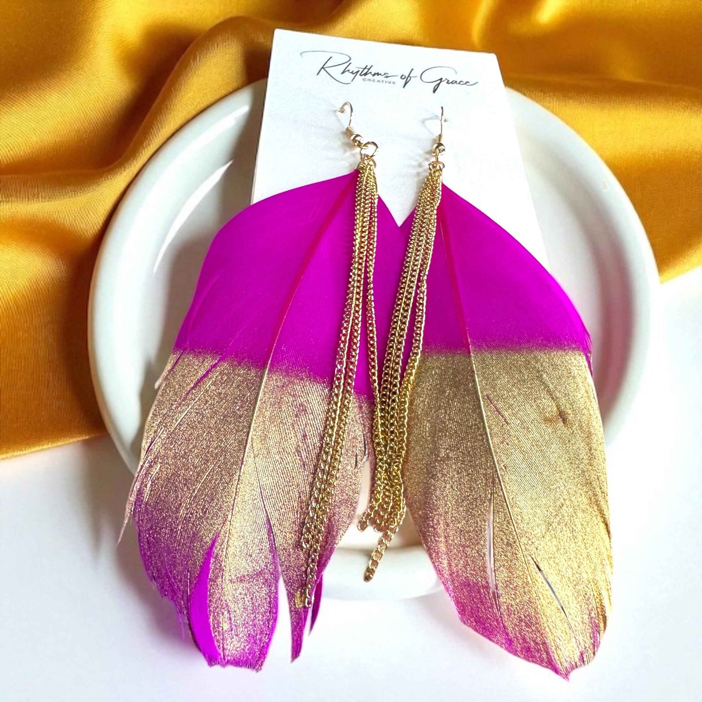 Gold Dipped Feather Earrings: Dance Into the Festivity!