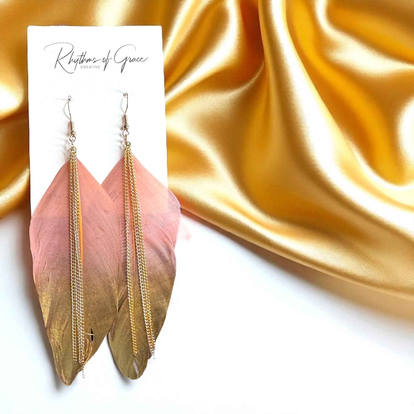 Gold Dipped Feather Earrings: Dance Into the Festivity!
