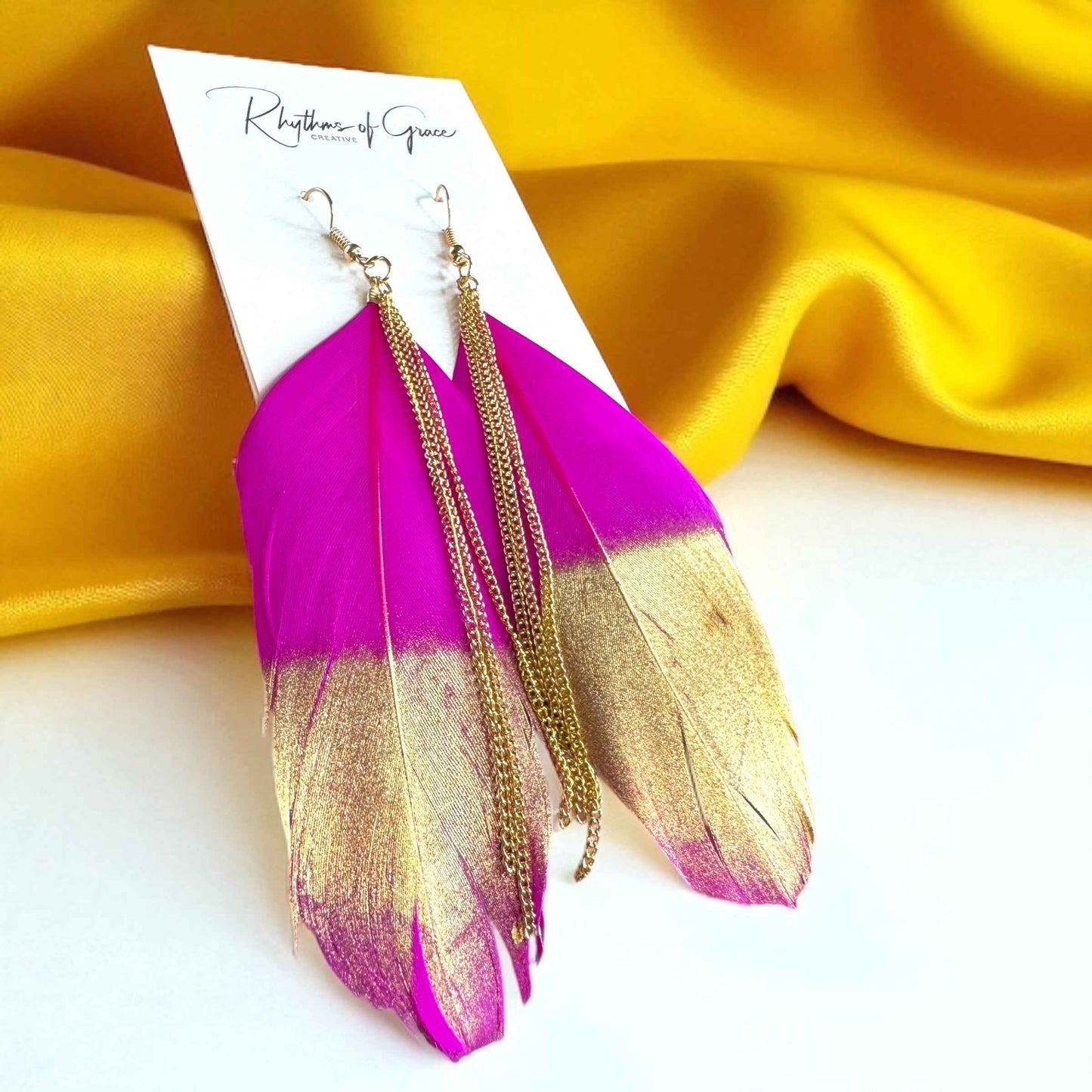 Gold Dipped Feather Earrings: Dance Into the Festivity!