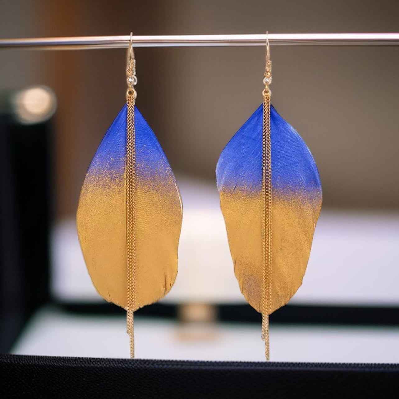 Gold Dipped Feather Earrings: Dance Into the Festivity!