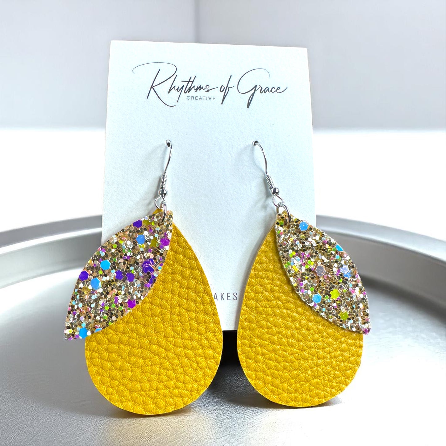 Golden Glow Teardrop Dangles: Shine Bright in Yellow!