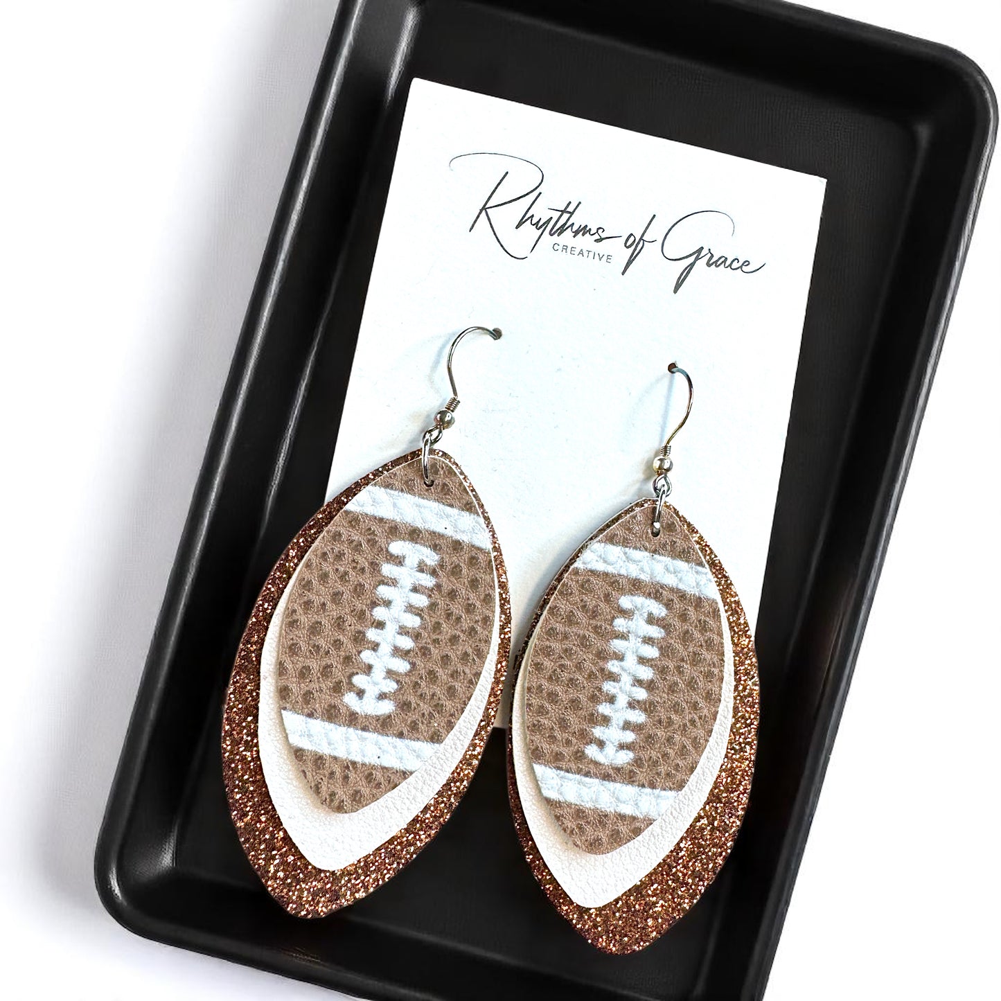 Game Day Glam: Brown and White Football Earrings for the Ultimate Fan!
