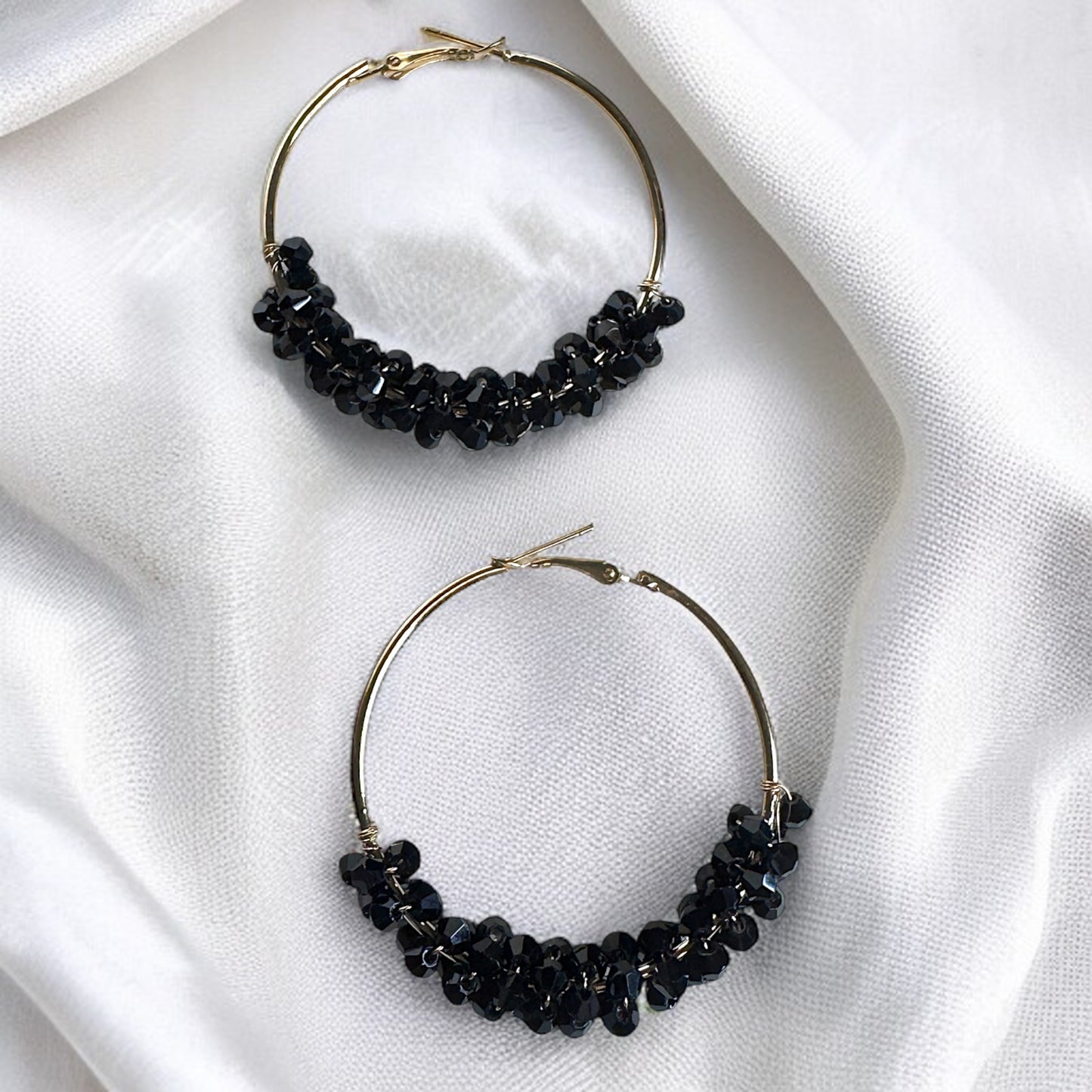 Chic Elegance: Black & Gold Beaded Hoop Earrings