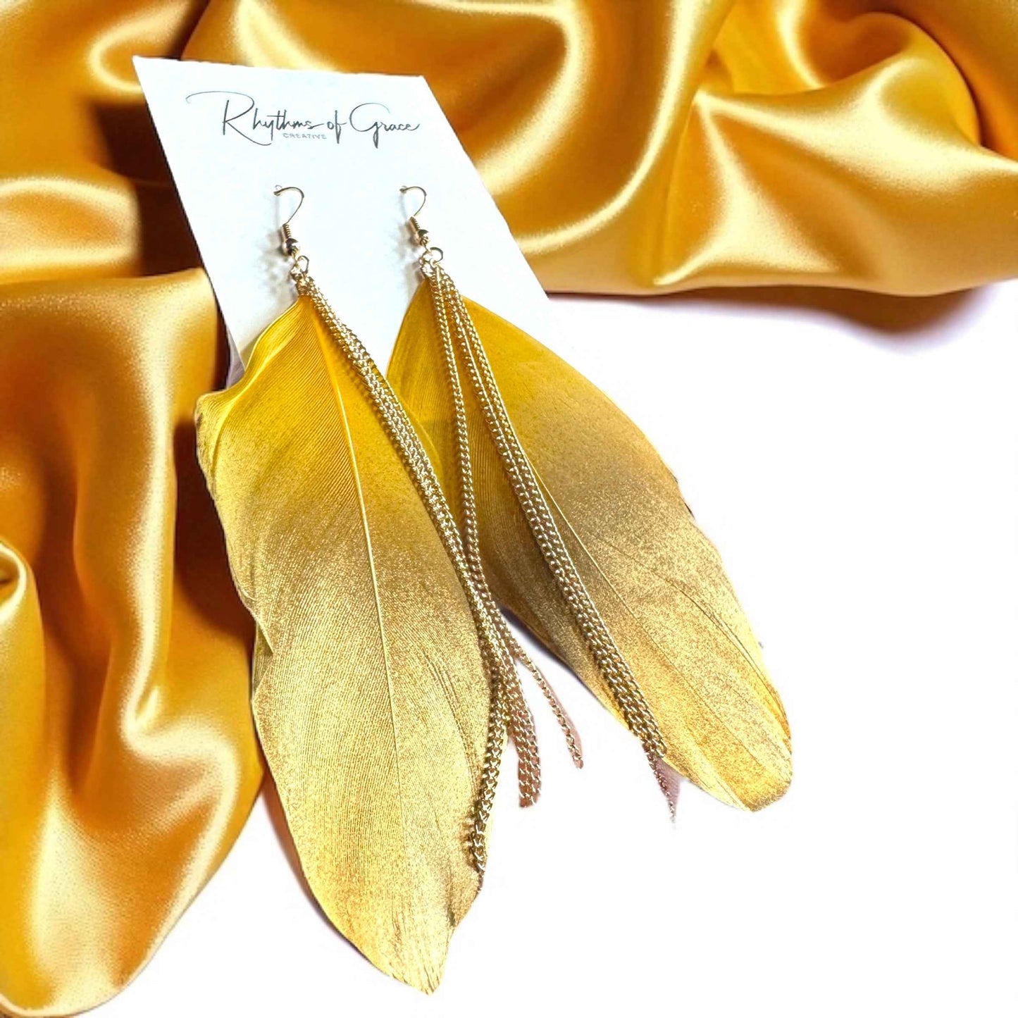 Gold Dipped Feather Earrings: Dance Into the Festivity!