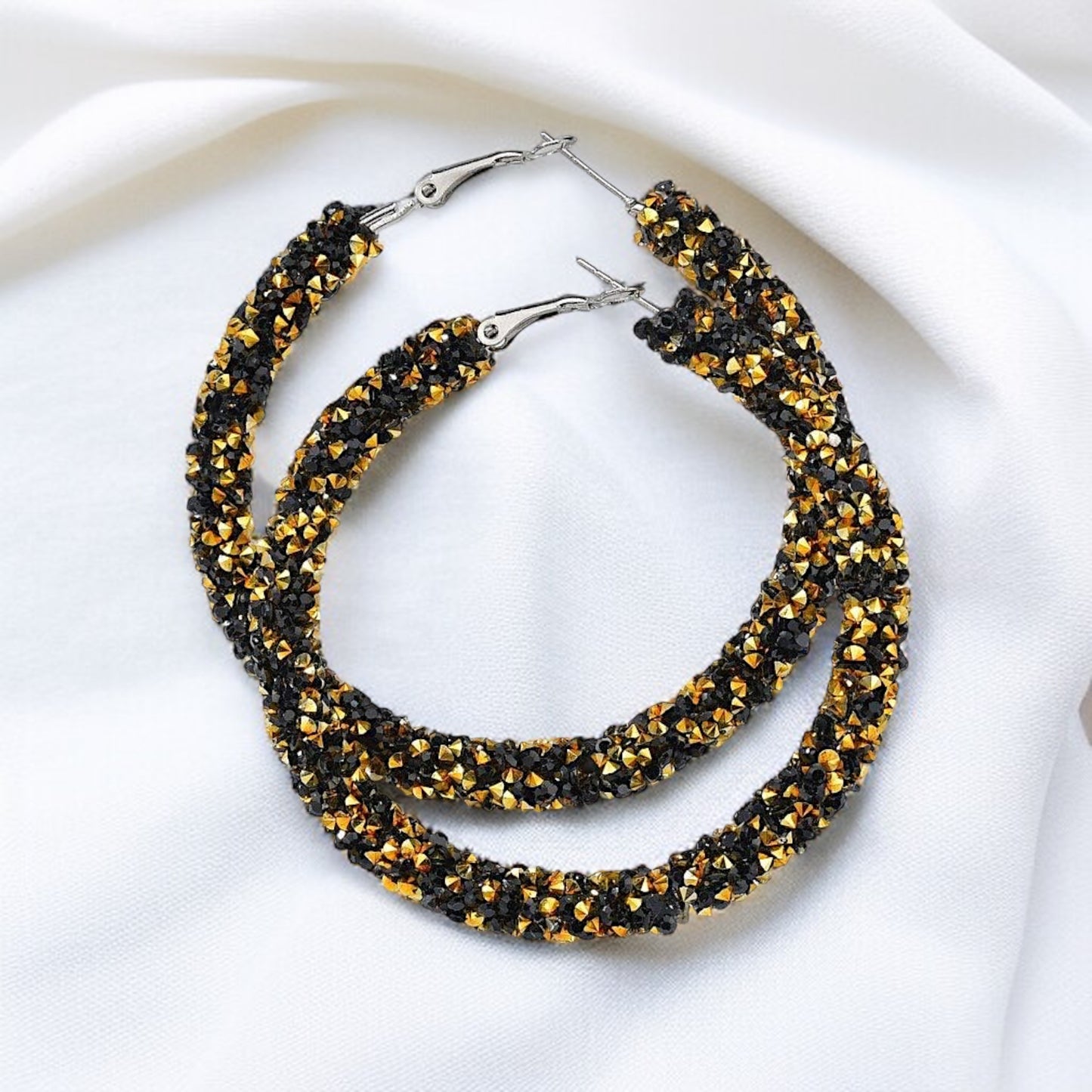 Shimmering Elegance: Black and Gold Glitter Hoops