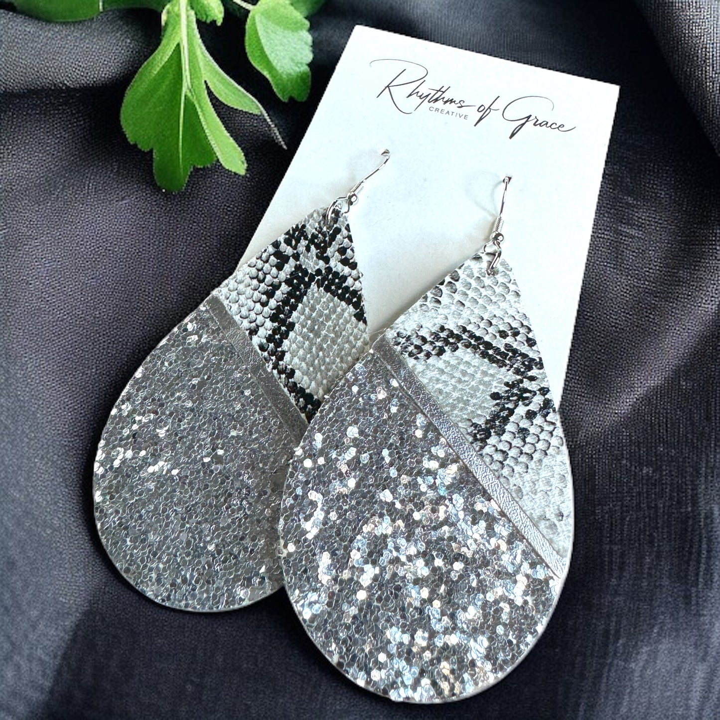 Slither in Style with Our Snake Print Teardrop Dangle Earrings! 🐍
