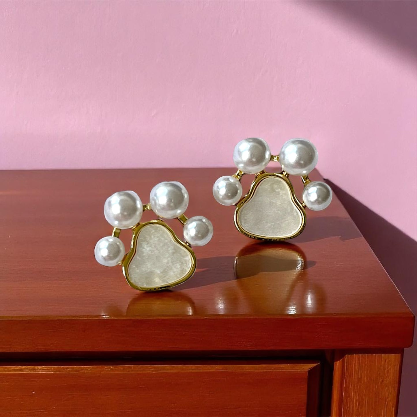 Sparkle with Style: Pearl Paw Print Stud Earrings! 🐾