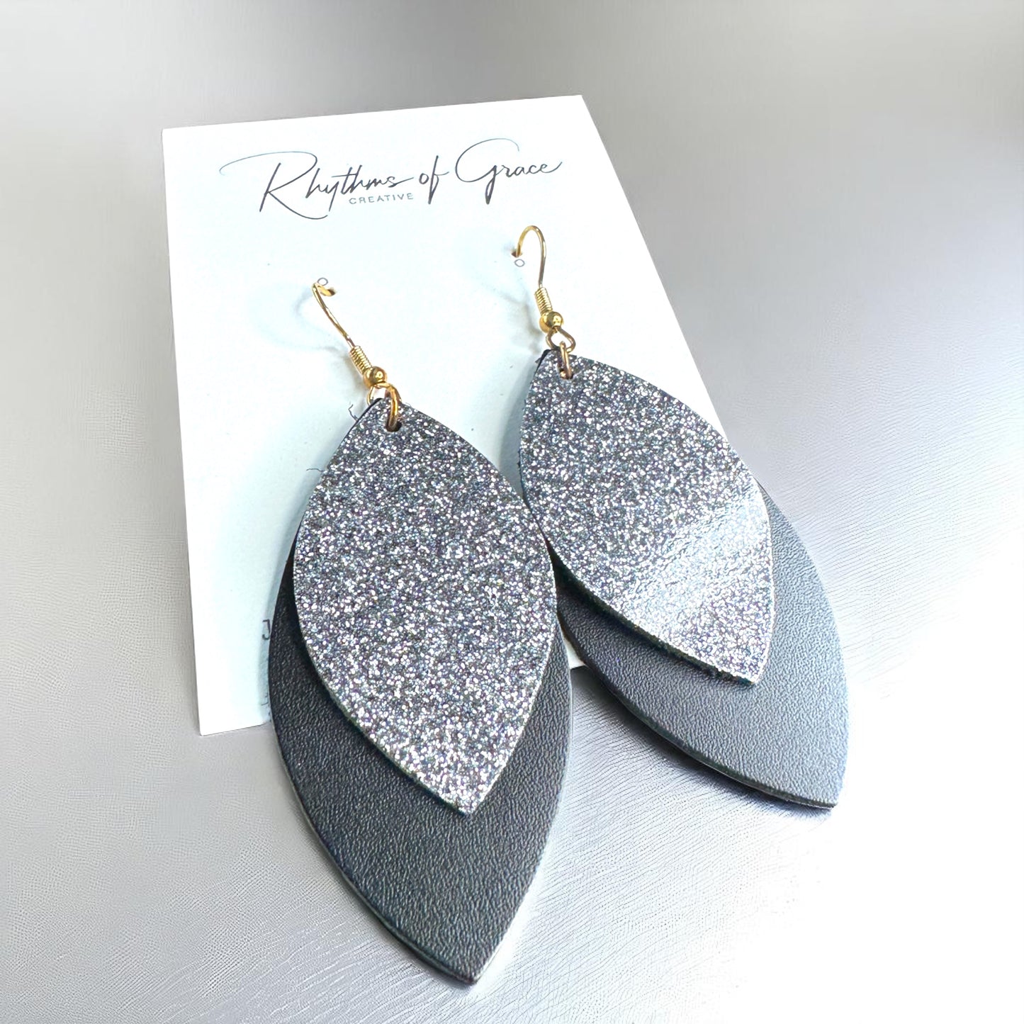 Spark Up Your Style: Chic Black Layered Leather Earrings - Gold or Silver Accent!