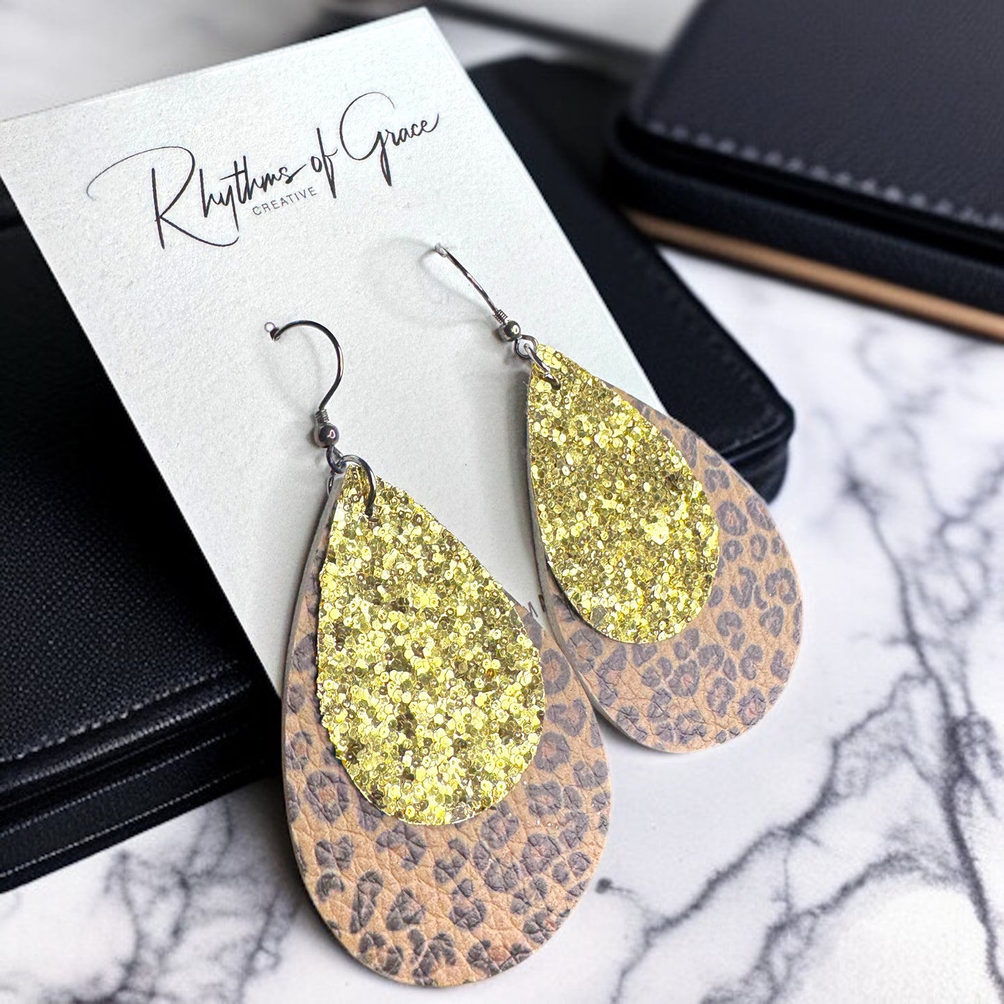 Unleash Your Inner Diva: Cheetah Print & Glitter Teardrop Earrings!