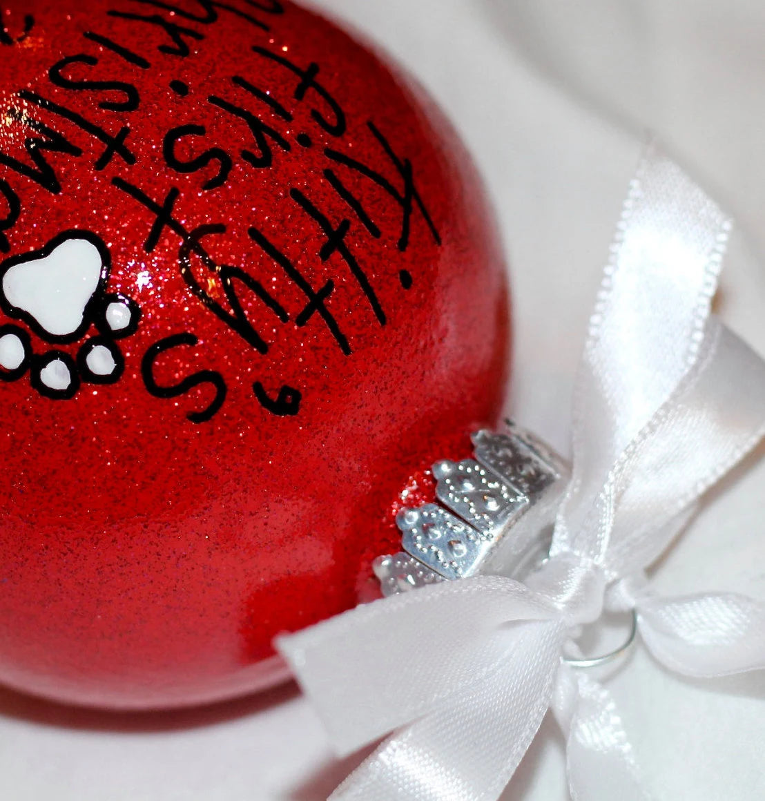Pawsitively Adorable: Kitty's First Christmas Ornament!